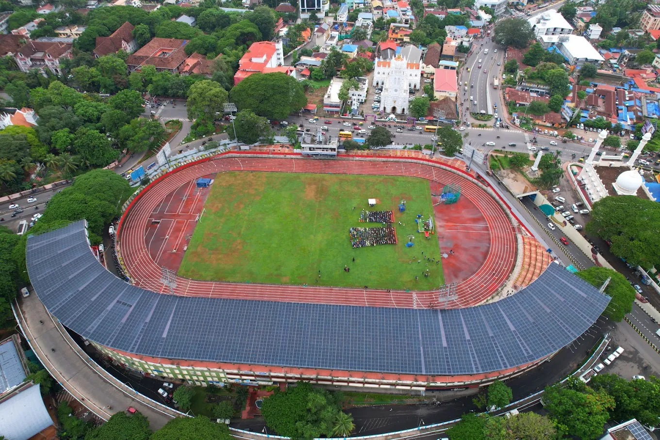 Top-down aerial view of the stadium showing the full solar canopy